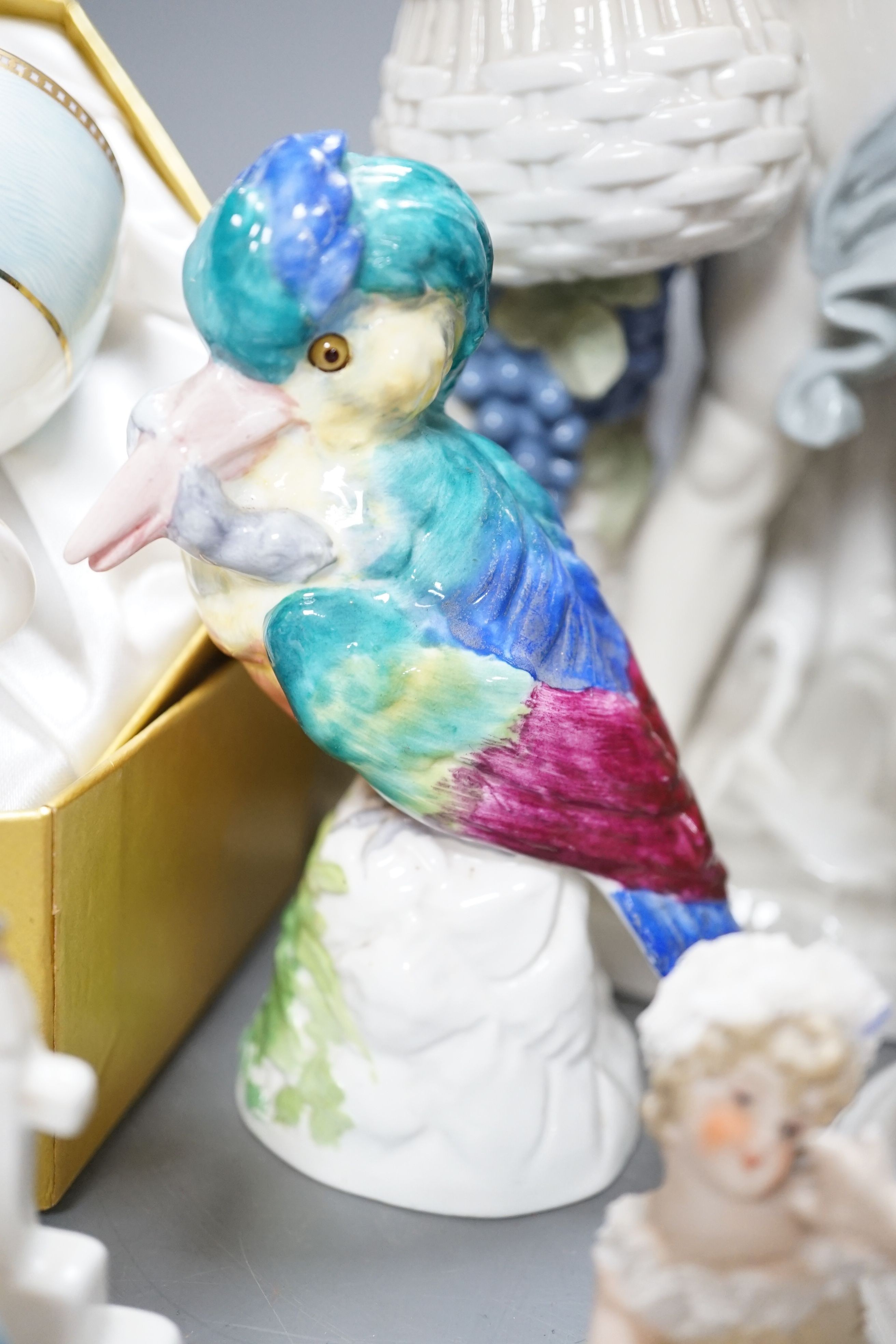 Ornamental china including uncommon three legged fairing, fairing 11 cms high, two continental porcelain groups, a Worcester figure the parakeet etc.